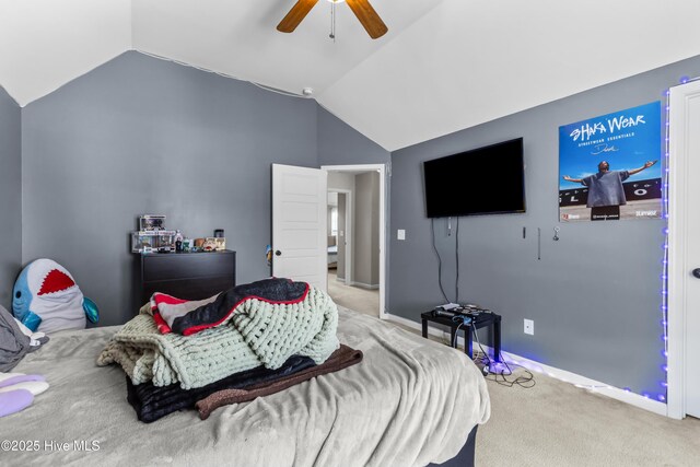 203 Holmes Point Ct, Jacksonville, NC 28546 - bedroom with lofted ceiling, carpet, a ceiling fan, and baseboards