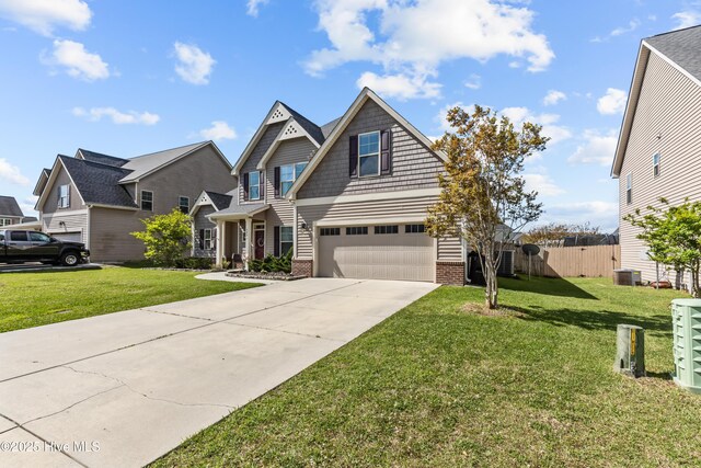 203 Holmes Point Ct, Jacksonville, NC 28546 - craftsman-style home with driveway, brick siding, an attached garage, central AC, and a residential view