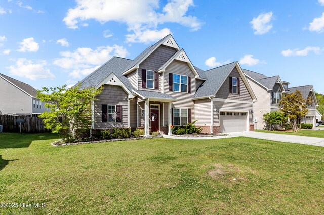 203 Holmes Point Ct, Jacksonville, NC 28546 - craftsman-style house featuring driveway, a garage, and roof with shingles