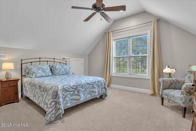 bedroom featuring carpet flooring, lofted ceiling, baseboards, and a ceiling fan