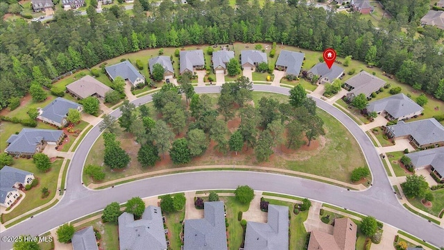 aerial view of property's location featuring nearby suburban area