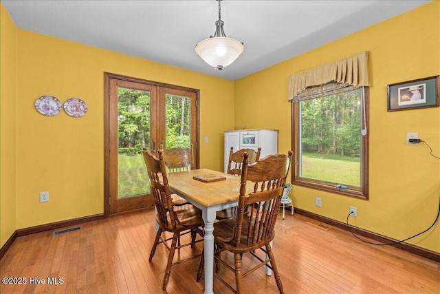 476 Paige Riddick Rd, Gates, NC 27937 - dining room featuring light wood-type flooring and baseboards