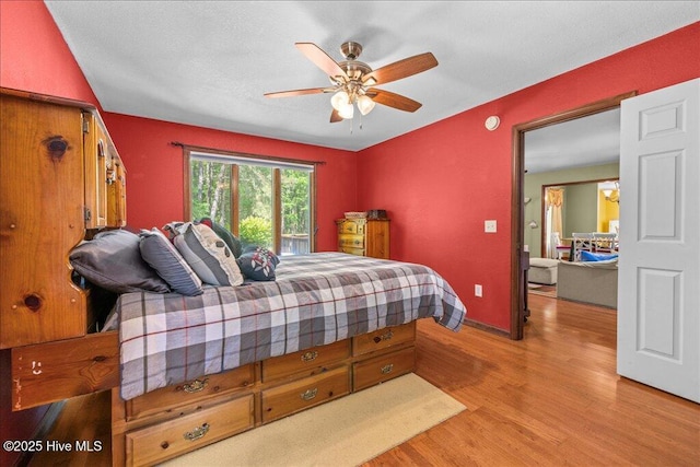 476 Paige Riddick Rd, Gates, NC 27937 - bedroom featuring wood finished floors, ceiling fan, and baseboards