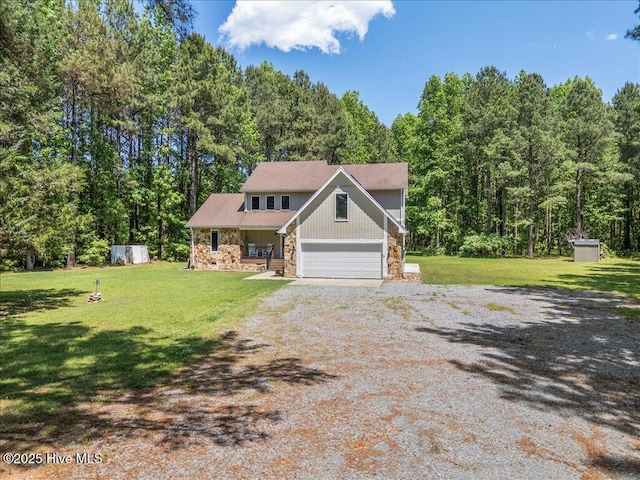 476 Paige Riddick Rd, Gates, NC 27937 - view of front of home with stone siding, covered porch, a front lawn, and driveway