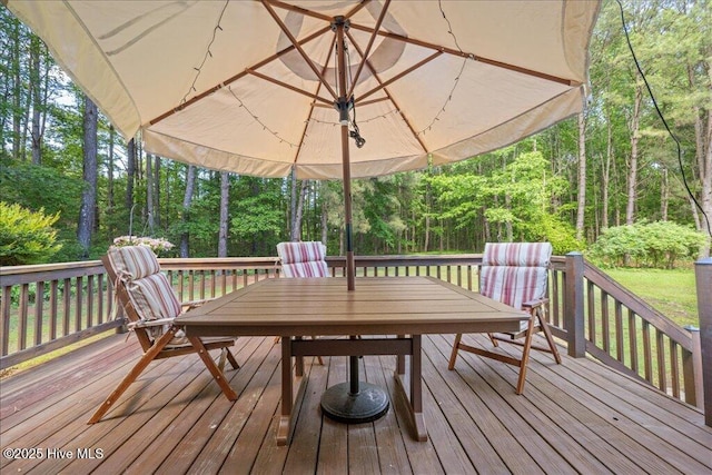 476 Paige Riddick Rd, Gates, NC 27937 - wooden terrace featuring outdoor dining space