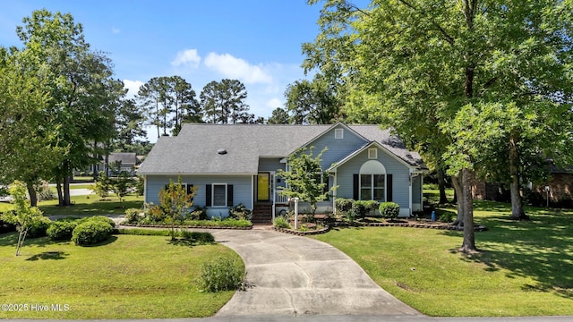 306 Channel Run Dr, New Bern, NC 28562 - view of front of home featuring a front lawn, concrete driveway, and a shingled roof
