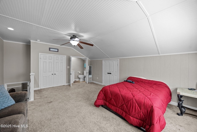 306 Channel Run Dr, New Bern, NC 28562 - bedroom featuring carpet floors, vaulted ceiling, baseboards, a ceiling fan, and connected bathroom