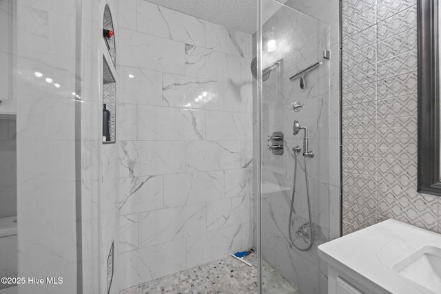 306 Channel Run Dr, New Bern, NC 28562 - bathroom with tiled shower, vanity, and tile walls