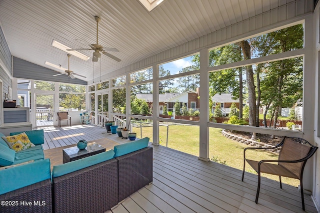306 Channel Run Dr, New Bern, NC 28562 - sunroom with a ceiling fan, a skylight, an outdoor living space, and vaulted ceiling