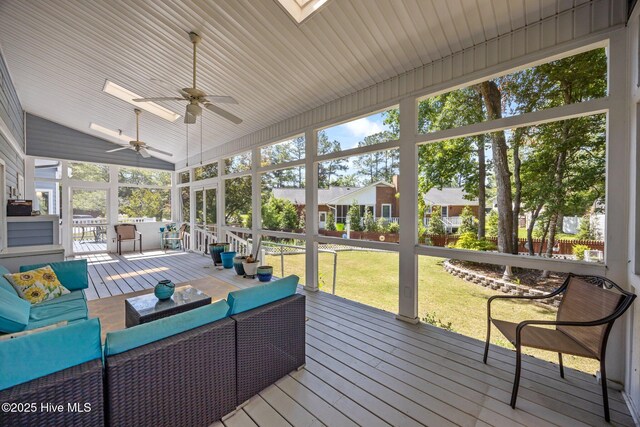 306 Channel Run Dr, New Bern, NC 28562 - sunroom with a ceiling fan, a skylight, an outdoor living space, and lofted ceiling