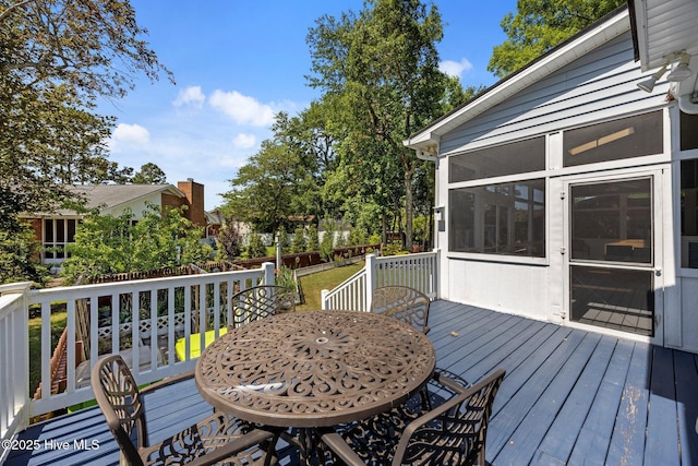 306 Channel Run Dr, New Bern, NC 28562 - deck with outdoor dining area and a sunroom