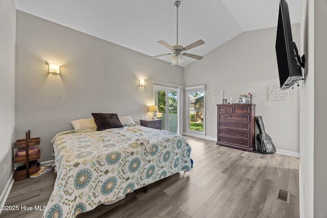 306 Channel Run Dr, New Bern, NC 28562 - bedroom with wood finished floors, baseboards, ceiling fan, and high vaulted ceiling