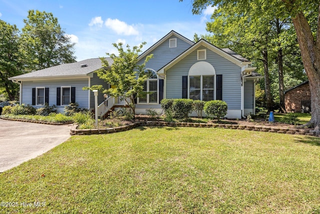 306 Channel Run Dr, New Bern, NC 28562 - ranch-style house with a front yard and concrete driveway