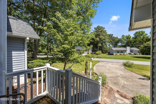 306 Channel Run Dr, New Bern, NC 28562 - wooden porch featuring a yard