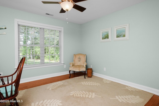 555 Dawson Creek Dr, Arapahoe, NC 28510 - sitting room featuring healthy amount of natural light, ceiling fan, baseboards, and wood finished floors