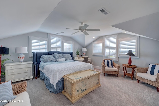 bedroom with vaulted ceiling, carpet, and a ceiling fan