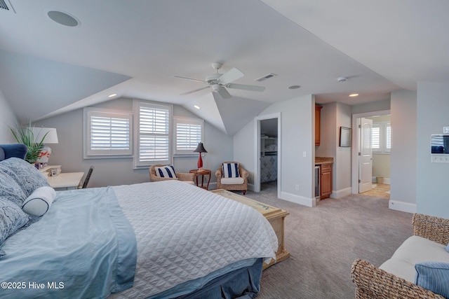 bedroom with light carpet, baseboards, lofted ceiling, ceiling fan, and a spacious closet