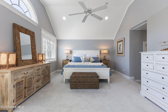 bedroom with light colored carpet, baseboards, high vaulted ceiling, and a ceiling fan