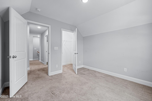 bonus room featuring vaulted ceiling, carpet flooring, baseboards, and recessed lighting