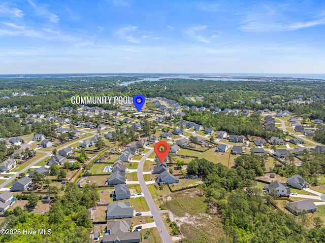 aerial view of property's location featuring nearby suburban area