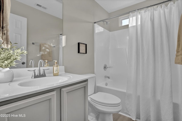 117 Clint Mills Rd, Maysville, NC 28555 - bathroom with toilet, shower / bath combo with shower curtain, vanity, and wood finished floors
