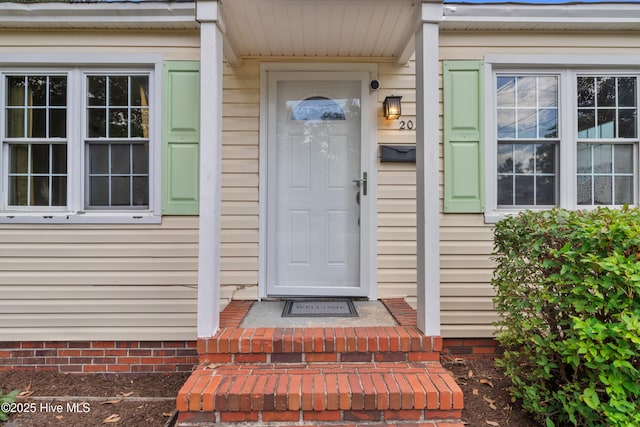 view of exterior entry with crawl space