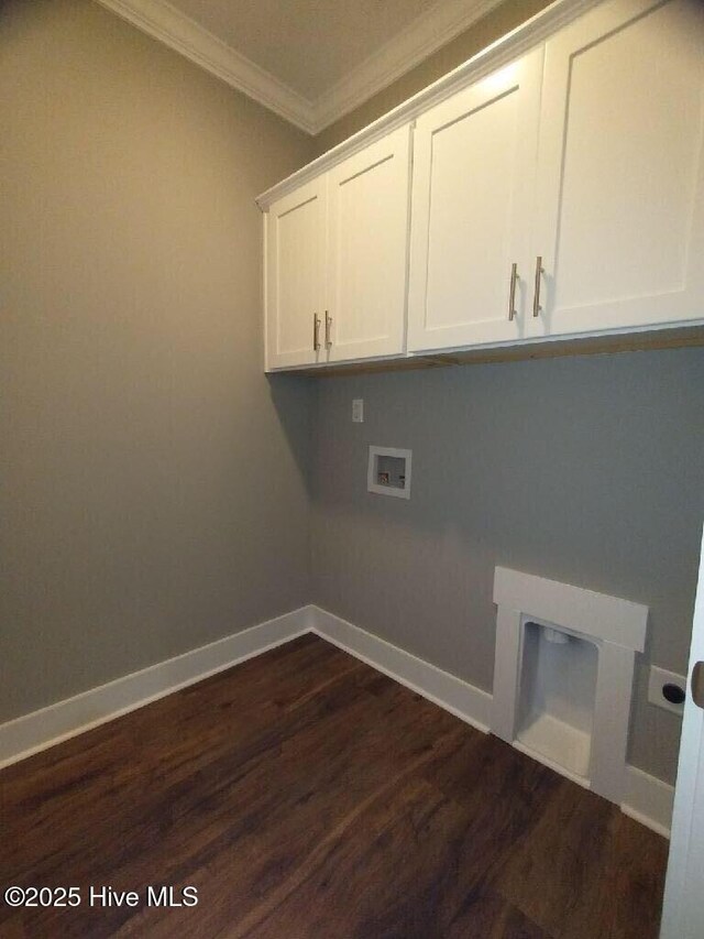 351 Newell Rd, Snow Hill, NC 28580 - laundry room featuring cabinet space, ornamental molding, washer hookup, dark wood-style floors, and baseboards