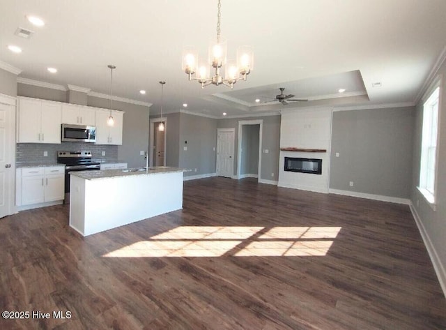 351 Newell Rd, Snow Hill, NC 28580 - kitchen with appliances with stainless steel finishes, ceiling fan, crown molding, a chandelier, and baseboards