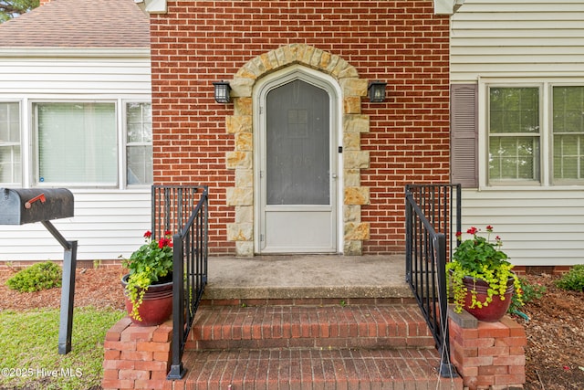 1306 W Church St, Elizabeth City, NC 27909 - view of exterior entry featuring brick siding