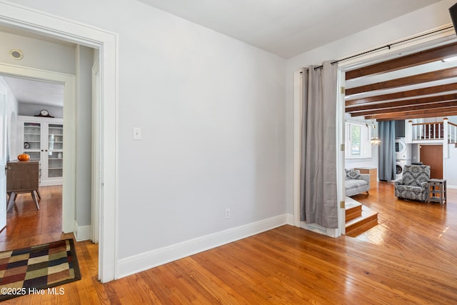 1306 W Church St, Elizabeth City, NC 27909 - spare room featuring wood finished floors and baseboards