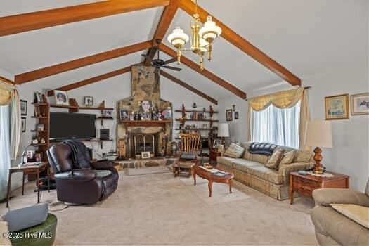 117 Arthur Rd, Beaufort, NC 28516 - carpeted living room with a ceiling fan, a chandelier, and a stone fireplace