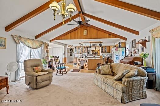 117 Arthur Rd, Beaufort, NC 28516 - carpeted living area featuring a chandelier and ceiling fan