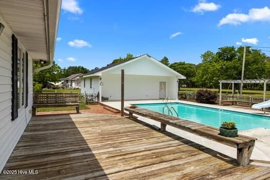 117 Arthur Rd, Beaufort, NC 28516 - view of pool featuring a deck, a water slide, and fence