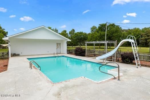 117 Arthur Rd, Beaufort, NC 28516 - view of swimming pool with a water slide and a patio