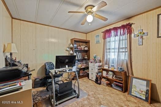 117 Arthur Rd, Beaufort, NC 28516 - office area with a ceiling fan, carpet flooring, and wood walls