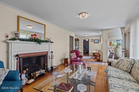 117 Arthur Rd, Beaufort, NC 28516 - living room with wood finished floors and a brick fireplace