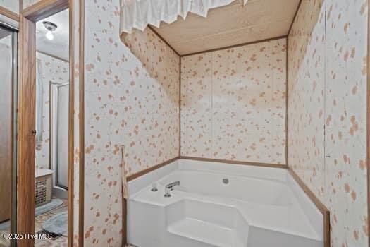 117 Arthur Rd, Beaufort, NC 28516 - full bath with wallpapered walls, a garden tub, and a shower stall