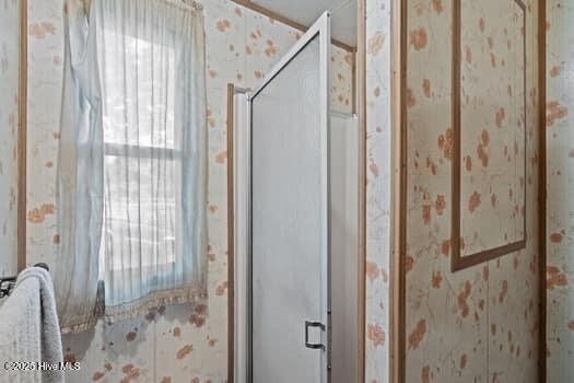 117 Arthur Rd, Beaufort, NC 28516 - full bathroom featuring wallpapered walls and a shower stall
