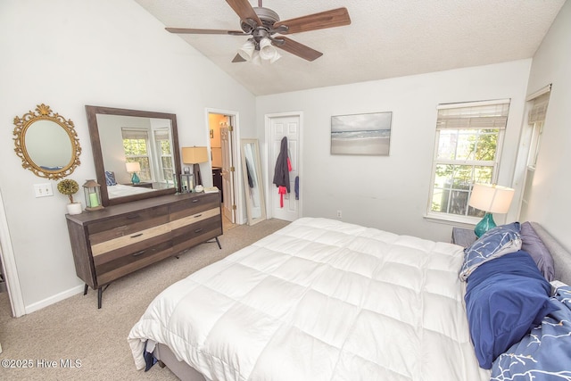 1009 Steeplechase Rd, Wilmington, NC 28412 - bedroom with light carpet, multiple windows, lofted ceiling, a textured ceiling, and ceiling fan