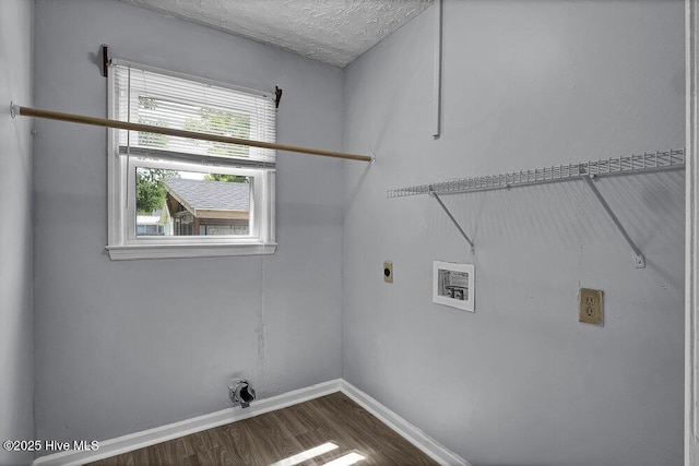 1912 Nun St, Wilmington, NC 28403 - laundry area with electric dryer hookup, wood finished floors, baseboards, washer hookup, and a textured ceiling