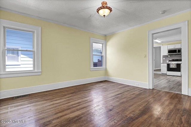 1912 Nun St, Wilmington, NC 28403 - empty room with dark wood-type flooring, ornamental molding, a textured ceiling, baseboards, and a smoke detector