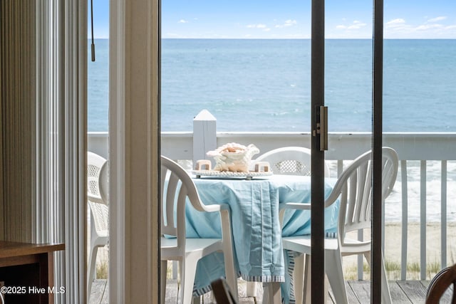 28 E First St Unit 4B, Ocean Isle Beach, NC 28469 - sunroom featuring a water view
