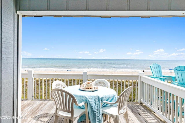 28 E First St Unit 4B, Ocean Isle Beach, NC 28469 - balcony featuring view of nearby beach and a deck with water view
