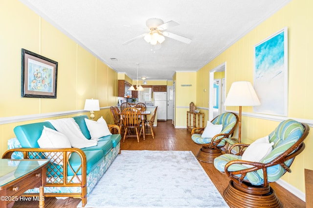 28 E First St Unit 4B, Ocean Isle Beach, NC 28469 - living room featuring crown molding, ceiling fan, and wood finished floors