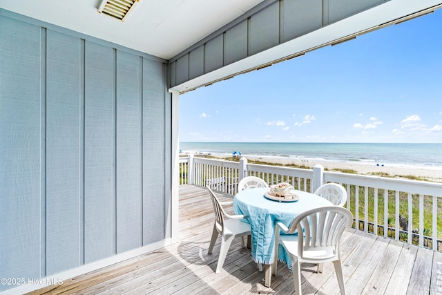 28 E First St Unit 4B, Ocean Isle Beach, NC 28469 - deck with view of water and beach and outdoor dining space