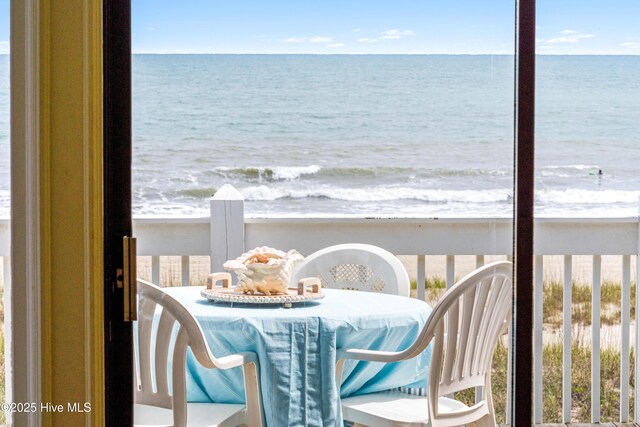 28 E First St Unit 4B, Ocean Isle Beach, NC 28469 - balcony featuring view of water and beach