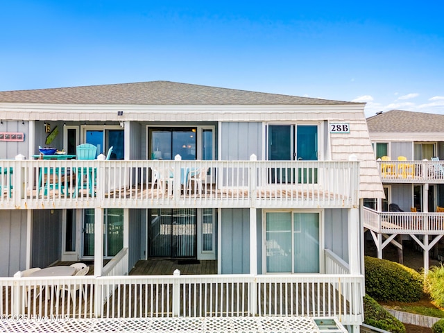 28 E First St Unit 4B, Ocean Isle Beach, NC 28469 - back of property featuring a shingled roof