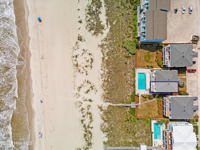 28 E First St Unit 4B, Ocean Isle Beach, NC 28469 - aerial view of waterfront with a beach and a pool