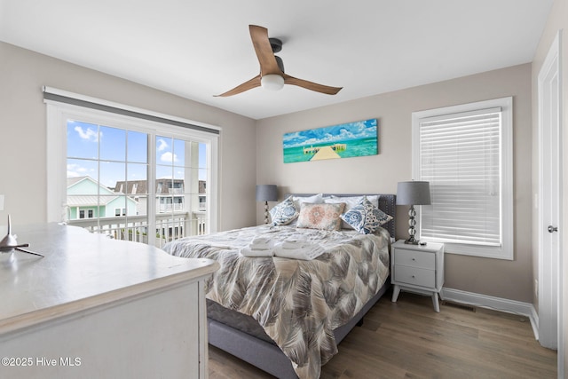 2721 W Beach Dr, Oak Island, NC 28465 - bedroom with wood finished floors, baseboards, and a ceiling fan
