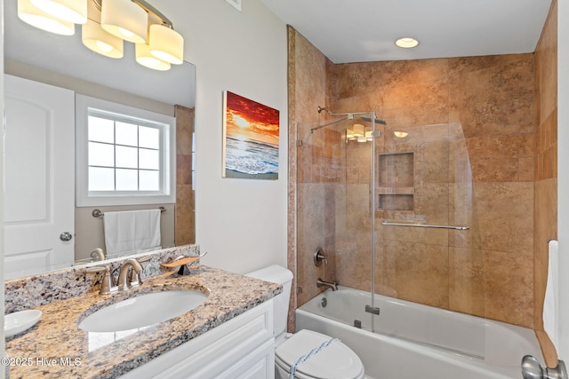 2721 W Beach Dr, Oak Island, NC 28465 - bathroom featuring toilet, bathing tub / shower combination, and vanity